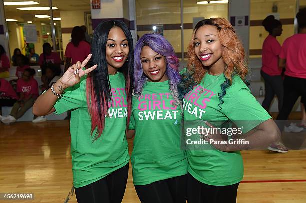 Bahja Rodriguez, Breaunna Womack, and Zonnique Pullins of OMG Girlz at Andrew & Walter Young YMCA on September 27, 2014 in Atlanta, Georgia.