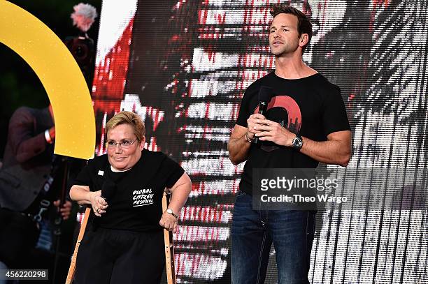 Vice President of the Caterpillar Foundation Michele Sullivan and United States Representative Aaron Schock speak onstage at the 2014 Global Citizen...