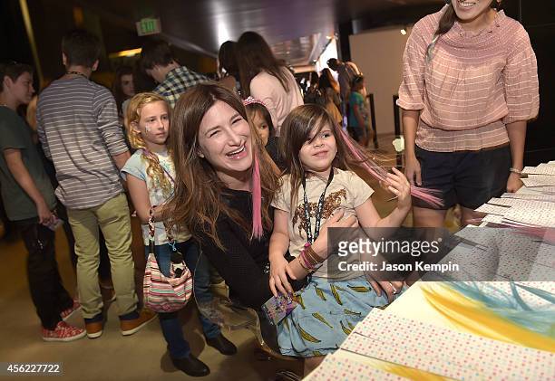 Actress Kathryn Hahn and daughter Mae Sandler attend the premiere of My Little Pony Equestria Girls Rainbow Rocks at TCL Chinese Theatre on September...