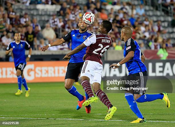 Deshorn Brown of Colorado Rapids controls the ball against Victor Bernardez and Pablo Pintos of San Jose Earthquakes at Dick's Sporting Goods Park on...