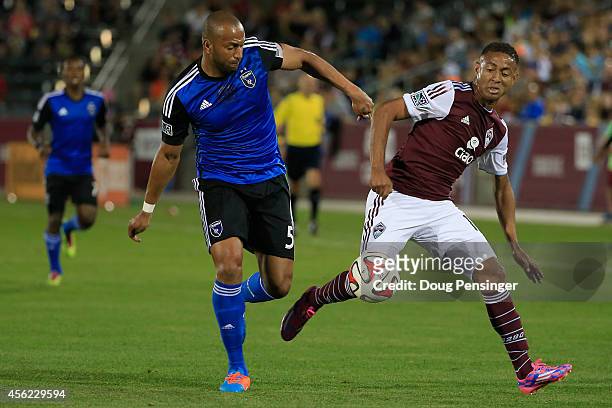 Victor Bernardez of San Jose Earthquakes and Gabriel Torres of Colorado Rapids battle for control of the ball at Dick's Sporting Goods Park on...