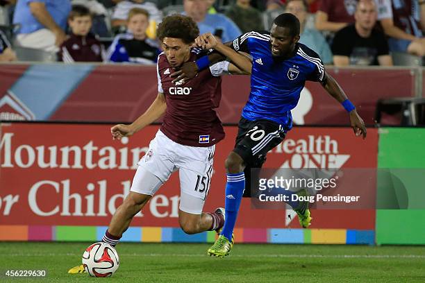 Chris Klute of Colorado Rapids and Shaun Francis of San Jose Earthquakes battle for control of the ball at Dick's Sporting Goods Park on September...