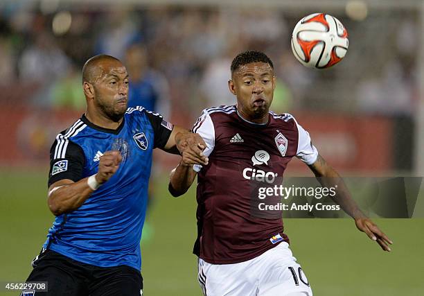 Colorado Rapids FWD, Gabriel Torres, right, and Victor Bernardez, DEF, San Jose Earthquakes, battles for control of the ball in the first half at...