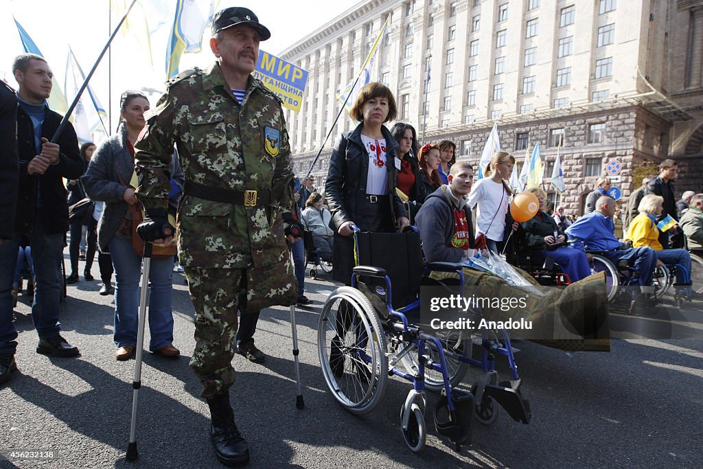 Disabled people organize peace walk in Kiev