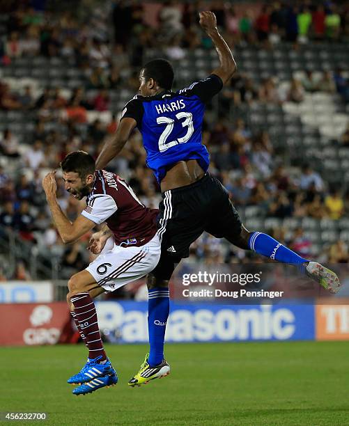 Atiba Harris of San Jose Earthquakes fouls Jose Mari of Colorado Rapids and received a yellow card in the 91st minute at Dick's Sporting Goods Park...