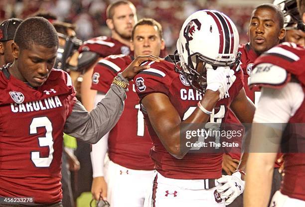 South Carolina players react to a 21-20 loss against Missouri at Williams-Brice Stadium in Columbia, S.C., Saturday, Sept. 27, 2014.