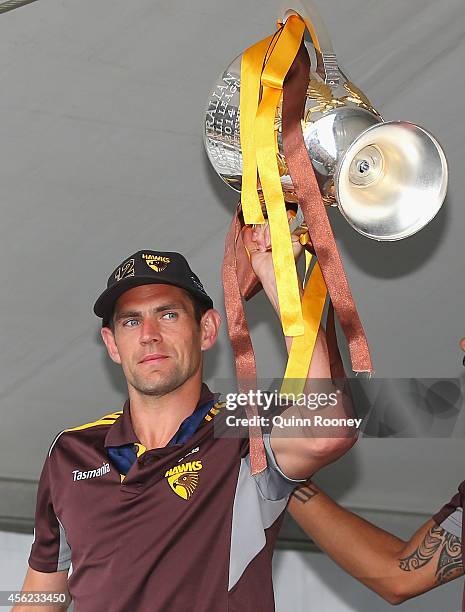 Luke Hodge of the Hawks shows the Premeirship Cup to the crowd at the Hawthorn Hawks AFL team celebration at Glenferrie Oval on September 28, 2014 in...