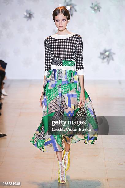 Model walks the runway during the Tsumori Chisato show as part of the Paris Fashion Week Womenswear Spring/Summer 2015 on September 27, 2014 in...