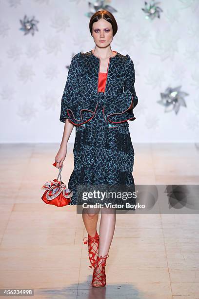 Model walks the runway during the Tsumori Chisato show as part of the Paris Fashion Week Womenswear Spring/Summer 2015 on September 27, 2014 in...