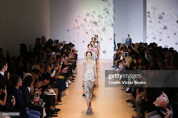 Model walks the runway during the Tsumori Chisato show as part of the Paris Fashion Week Womenswear Spring/Summer 2015 on September 27, 2014 in...