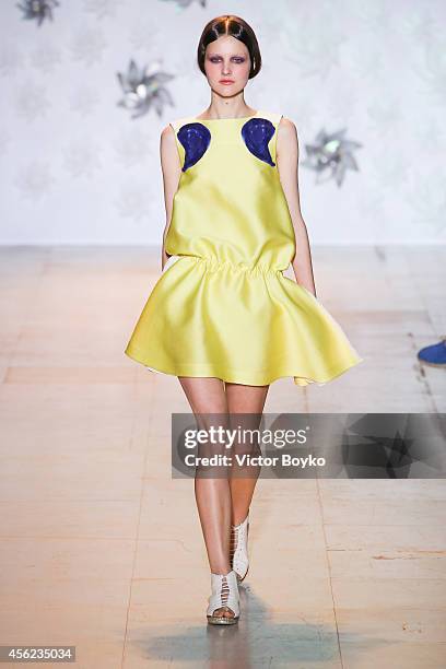 Model walks the runway during the Tsumori Chisato show as part of the Paris Fashion Week Womenswear Spring/Summer 2015 on September 27, 2014 in...