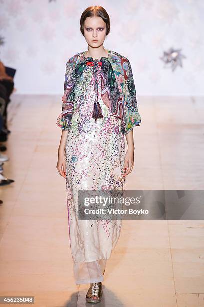 Model walks the runway during the Tsumori Chisato show as part of the Paris Fashion Week Womenswear Spring/Summer 2015 on September 27, 2014 in...