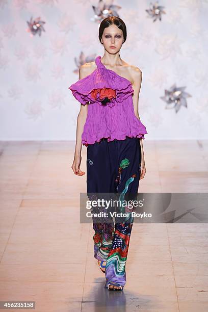Model walks the runway during the Tsumori Chisato show as part of the Paris Fashion Week Womenswear Spring/Summer 2015 on September 27, 2014 in...