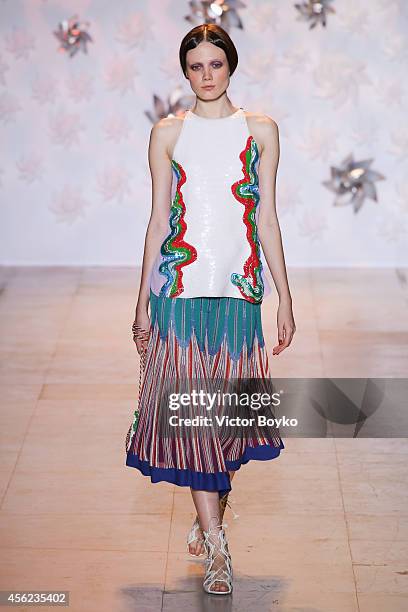 Model walks the runway during the Tsumori Chisato show as part of the Paris Fashion Week Womenswear Spring/Summer 2015 on September 27, 2014 in...