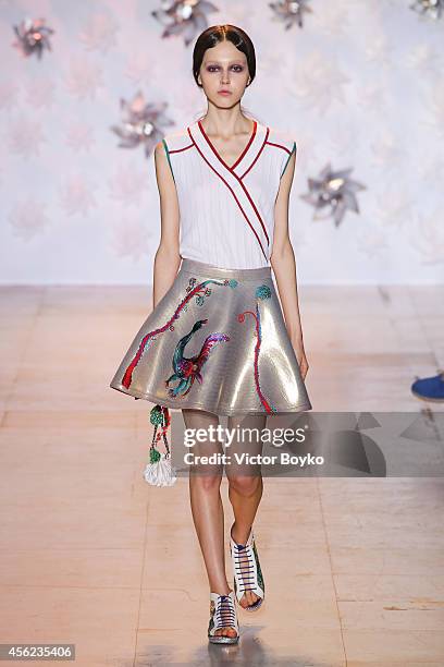 Model walks the runway during the Tsumori Chisato show as part of the Paris Fashion Week Womenswear Spring/Summer 2015 on September 27, 2014 in...