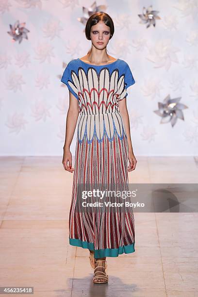 Model walks the runway during the Tsumori Chisato show as part of the Paris Fashion Week Womenswear Spring/Summer 2015 on September 27, 2014 in...