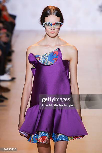 Model walks the runway during the Tsumori Chisato show as part of the Paris Fashion Week Womenswear Spring/Summer 2015 on September 27, 2014 in...