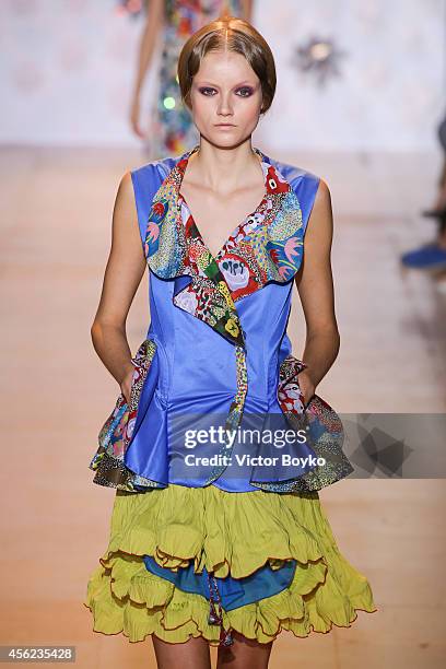 Model walks the runway during the Tsumori Chisato show as part of the Paris Fashion Week Womenswear Spring/Summer 2015 on September 27, 2014 in...