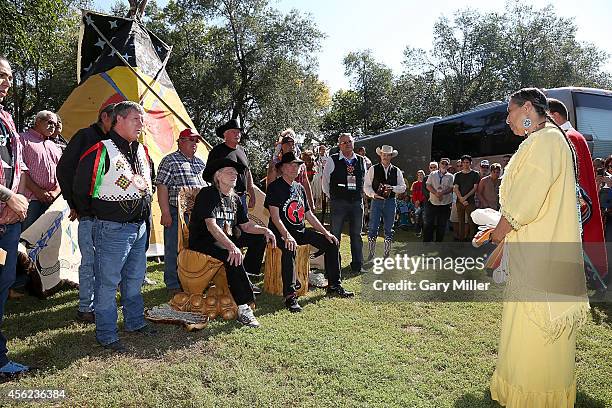 Rosebud Sioux Tribal President Cyril Scott, Willie Nelson, Neil Young, Ogalala Sioux Tribal President Bryan Brewer listen as Casey Camp speaks during...