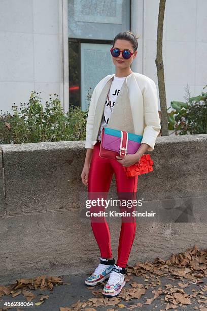 Fashion Student Nina Sieber is wearing a Maria Hoermanseder top, Nike trainers, American Apparel leggings, Etre Cecile top, Paula Cademartori bag,...