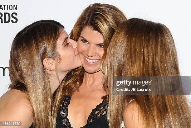 Lori Loughlin, center, and daughters Olivia Giannulli and Isabella Giannulli attend the 4th Annual American Humane Association Hero Dog Awards hosted...