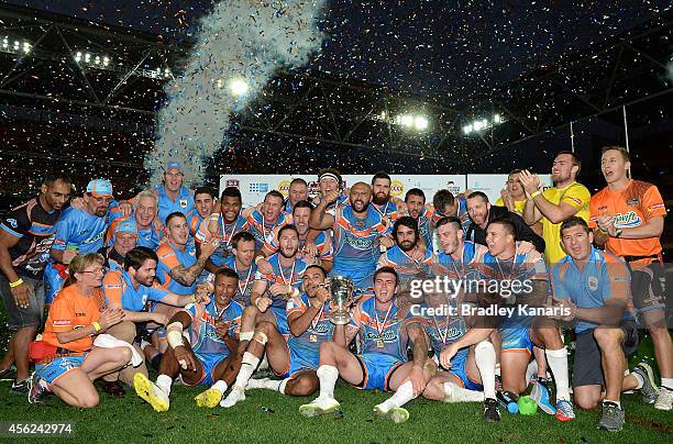 The Northern Pride celebrate victory after the Intrust Super Cup Grand Final match between Northern Pride and Easts Tigers at Suncorp Stadium on...