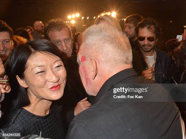 Minister Fleur Pellerin and Jean Paul Gaultier attend The Jean Paul Gaultier show as part of the Paris Fashion Week Womenswear Spring/Summer 2015 at...