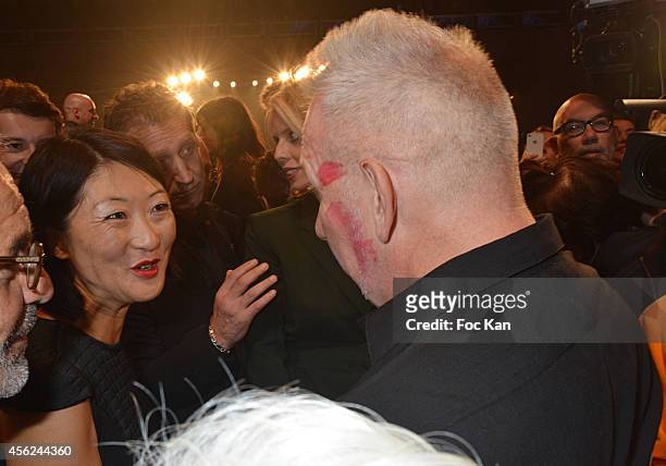Minister Fleur Pellerin and Jean Paul Gaultier attend The Jean Paul Gaultier show as part of the Paris Fashion Week Womenswear Spring/Summer 2015 at...