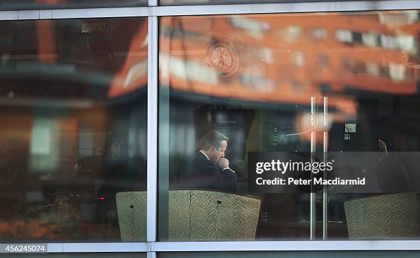 Prime Minister David Cameron pauses during a interview on the Andrew Marr TV show on September 28, 2014 in Birmingham, England. The governing...