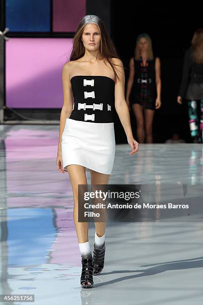 Model walks the runway during the Maxime Simoens show as part of the Paris Fashion Week Womenswear Spring/Summer 2015 on September 28, 2014 in Paris,...