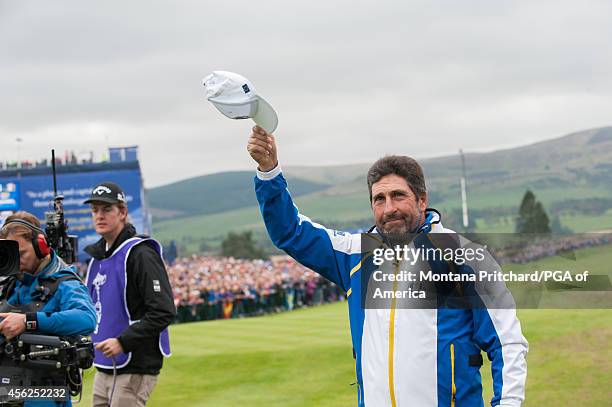 European Ryder Cup Assistant Captain Jose Maria Olazabal waves to the crowd on the first tee during the singles matches for the 40th Ryder Cup at...