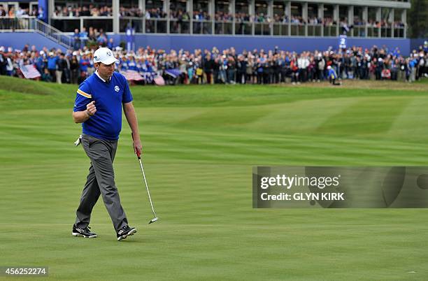 Team Europe's Stephen Gallacher of Scotland celebrates putting a birdie on the second green during Sunday's Singles matches on the final day of the...