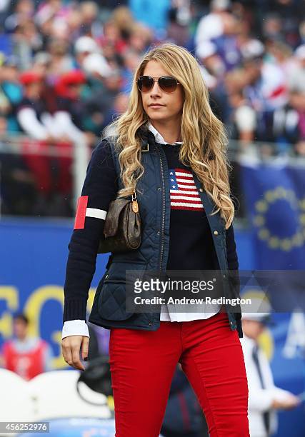 Keegan Bradley's partner Jillian Stacey walks the course during the Singles Matches of the 2014 Ryder Cup on the PGA Centenary course at the...