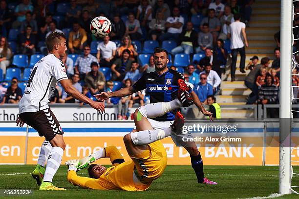 Goalkeeper Philipp Tschauner of St. Pauli watches Philipp Ziereis of St. Pauli score an own goal against during the Second Bundesliga match between...