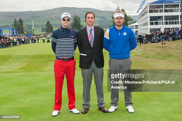 Ryder Cup Team Member Zach Johnson of the United States and European Ryder Cup Team Member Victor Dubuisson of France pose for a photo on the first...