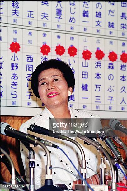 Takako Doi, Head of the Japan Socialist Party looks buoyant as the results of her partyÂfs victory in the Upper House election are posted on July...