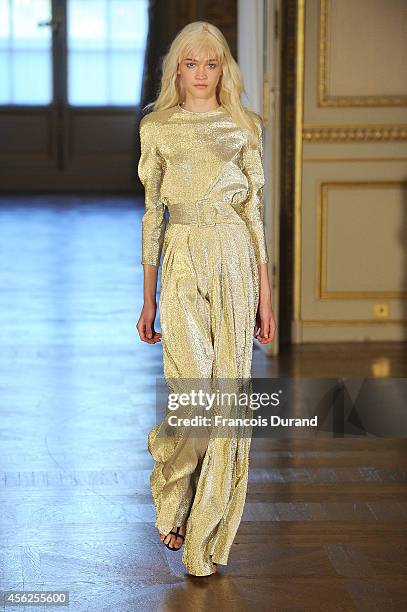 Model walks the runway during the Martin Grant show as part of the Paris Fashion Week Womenswear Spring/Summer 2015 on September 28, 2014 in Paris,...