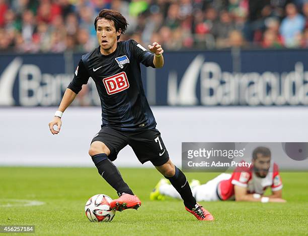 Hajime Hosogai of Hertha in action during the Bundesliga match between FC Augsburg and Hertha BSC at SGL Arena on September 28, 2014 in Augsburg,...