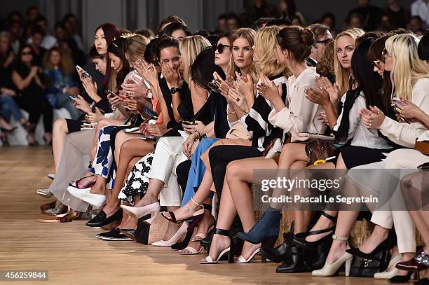 Rosie Huntington-Whiteley attends the Chloe show as part of the Paris Fashion Week Womenswear Spring/Summer 2015 on September 28, 2014 in Paris,...