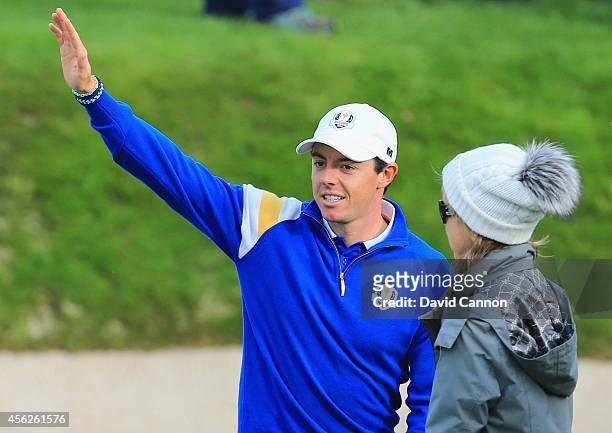 Rory McIlroy of Europe celebrates winning the Ryder Cup on the 15th hole after Jamie Donaldson of Europe defeated Keegan Bradley of the United States...