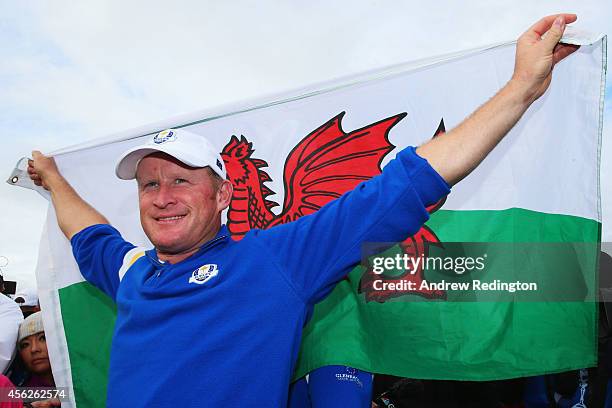 Jamie Donaldson of Europe celebrates on the 15th hole after Europe won the Ryder Cup with Donaldson defeating Keegan Bradley of the United States...