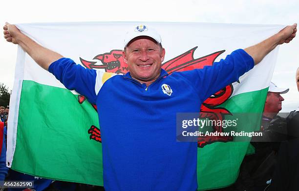 Jamie Donaldson of Europe celebrates on the 15th hole after Europe won the Ryder Cup with Donaldson defeating Keegan Bradley of the United States...