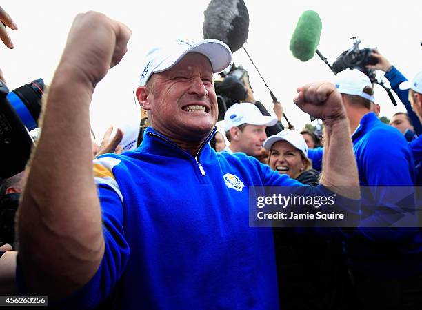 Jamie Donaldson of Europe celebrates on the 15th hole after Europe won the Ryder Cup with Donaldson defeating Keegan Bradley of the United States...