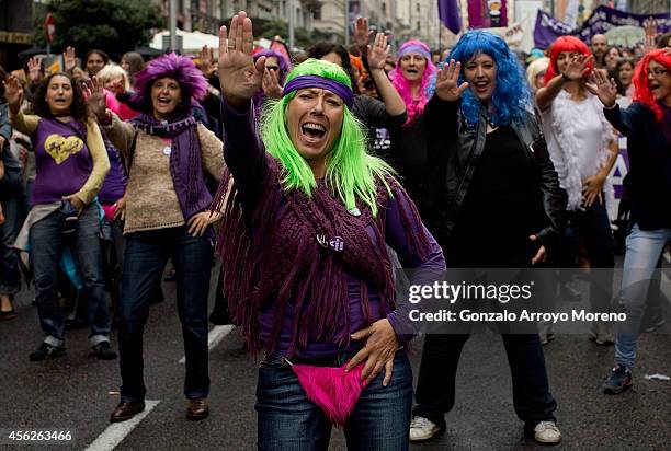 Women dance during a demonstration supporting reproductive rights for women on September 28, 2014 in Madrid, Spain. During an international day...