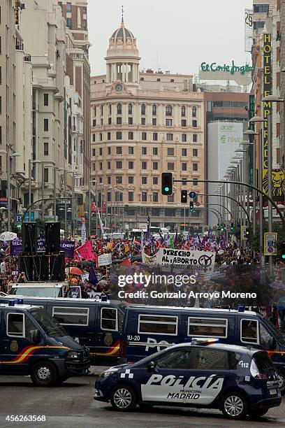 Police vans guard the end of a demonstration supporting reproductive rights for women at Gran Via Street on September 28, 2014 in Madrid, Spain....