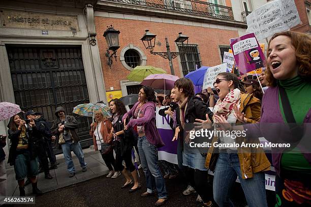 Women dance in front of the Spanish Justice Ministry during a demonstration supporting reproductive rights for women on September 28, 2014 in Madrid,...