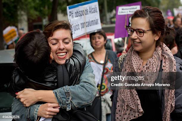 Two women embrace during a demonstration supporting reproductive rights for women on September 28, 2014 in Madrid, Spain. During an international day...