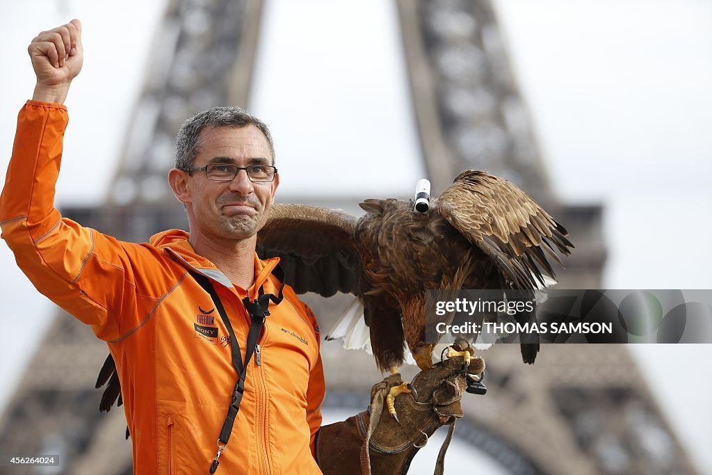 French falconer Jacques Olivier Travers presents a white-tailed eagle ...