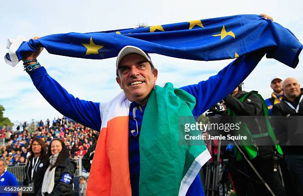 Europe team captain Paul McGinley celebrates winning the Ryder Cup during the Singles Matches of the 2014 Ryder Cup on the PGA Centenary course at...