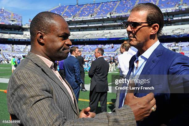 DeMaurice Smith , Executive Director of the NFLPA, speaks with Baltimore Ravens owner Steve Bisciotti before a game against the Carolina Panthers at...